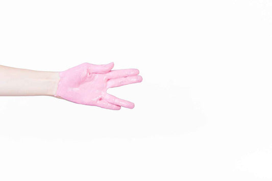 pink nitrile exam gloves in a clinic